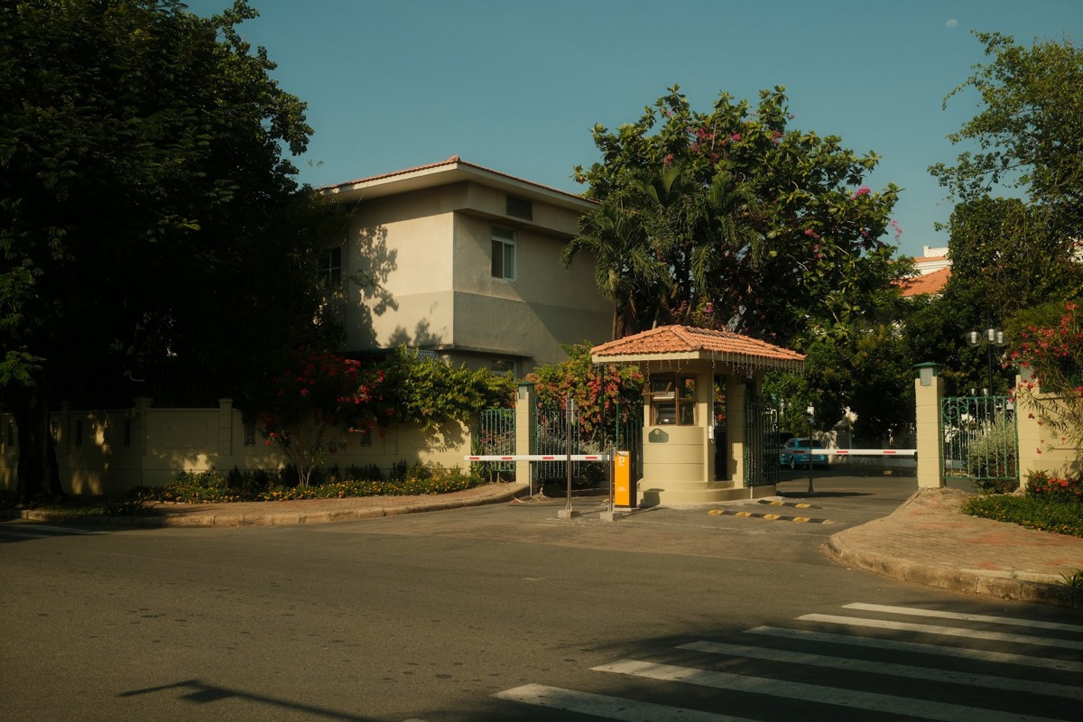 Gated community entrance with a security booth